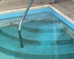Pool Steps with metal stains
