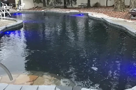 Help! My pool water is black and cloudy.